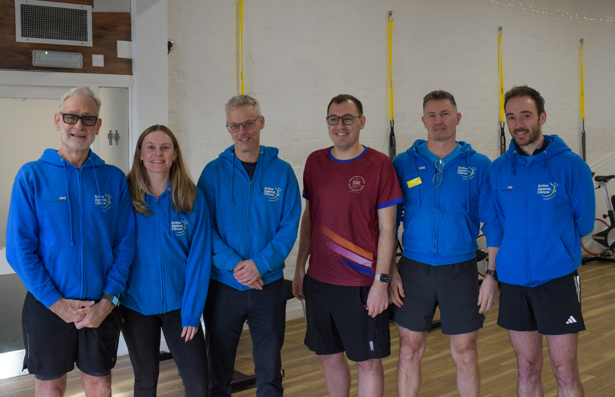 Tom Gordon MP with members of the Active Against Cancer team.