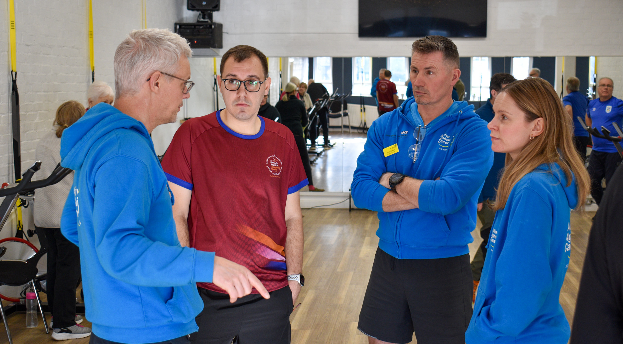 Tom Gordon MP with members of the Active Against Cancer team.